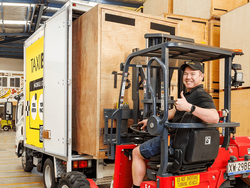 Andrew thumbs up fetch truck