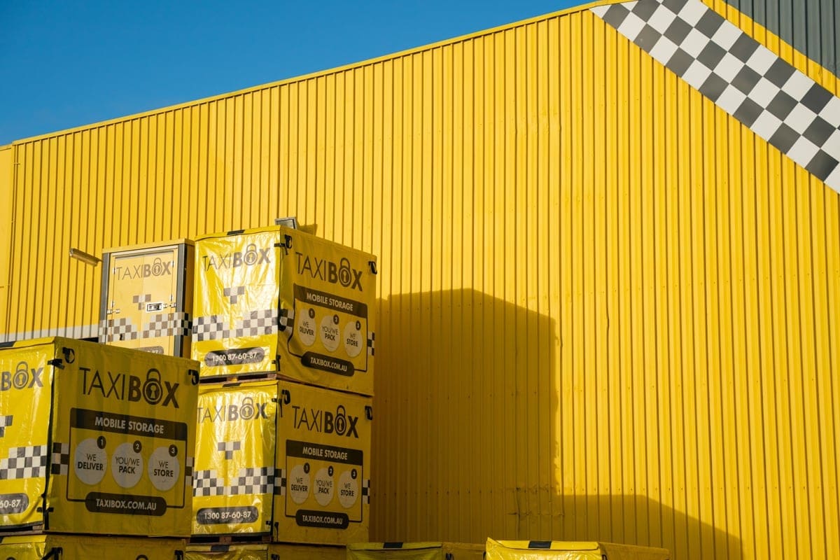 Yellow TAXIBOXES outside the Banyo storage facility