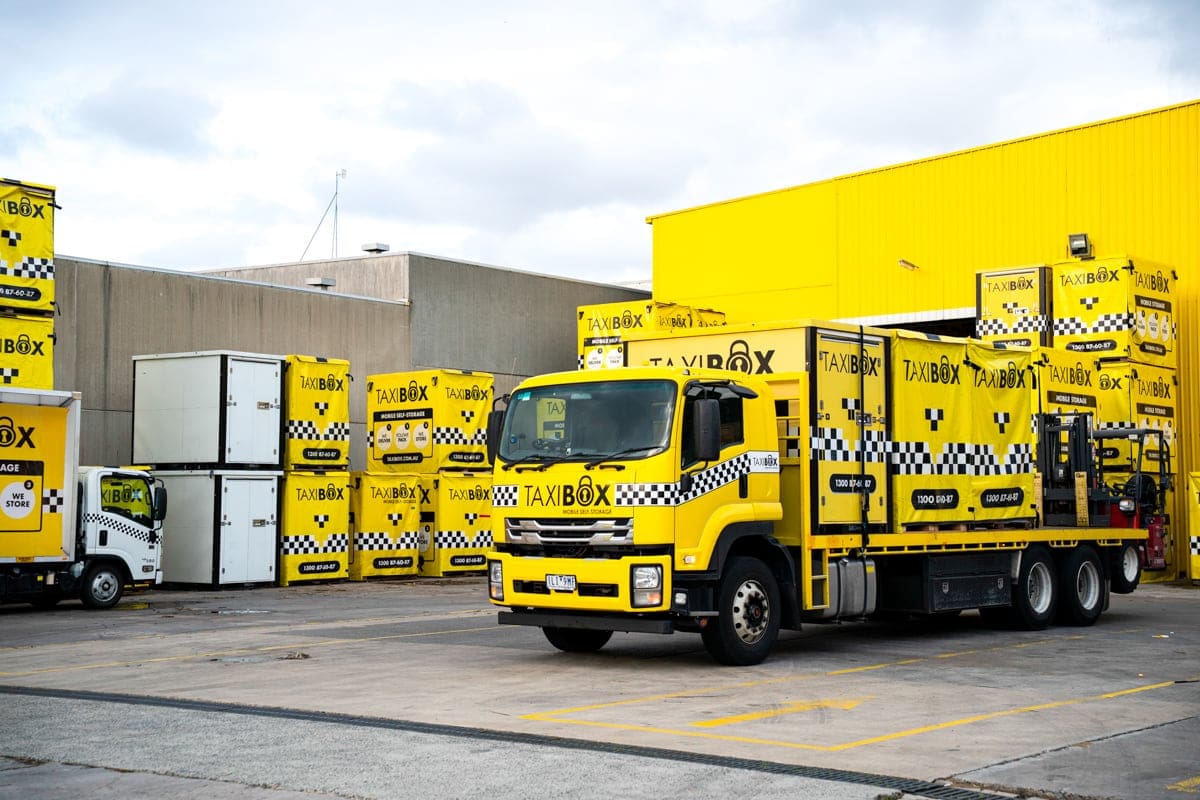 A TAXIBOX truck with TAXIBOX boxes outside the Braeside storage facility